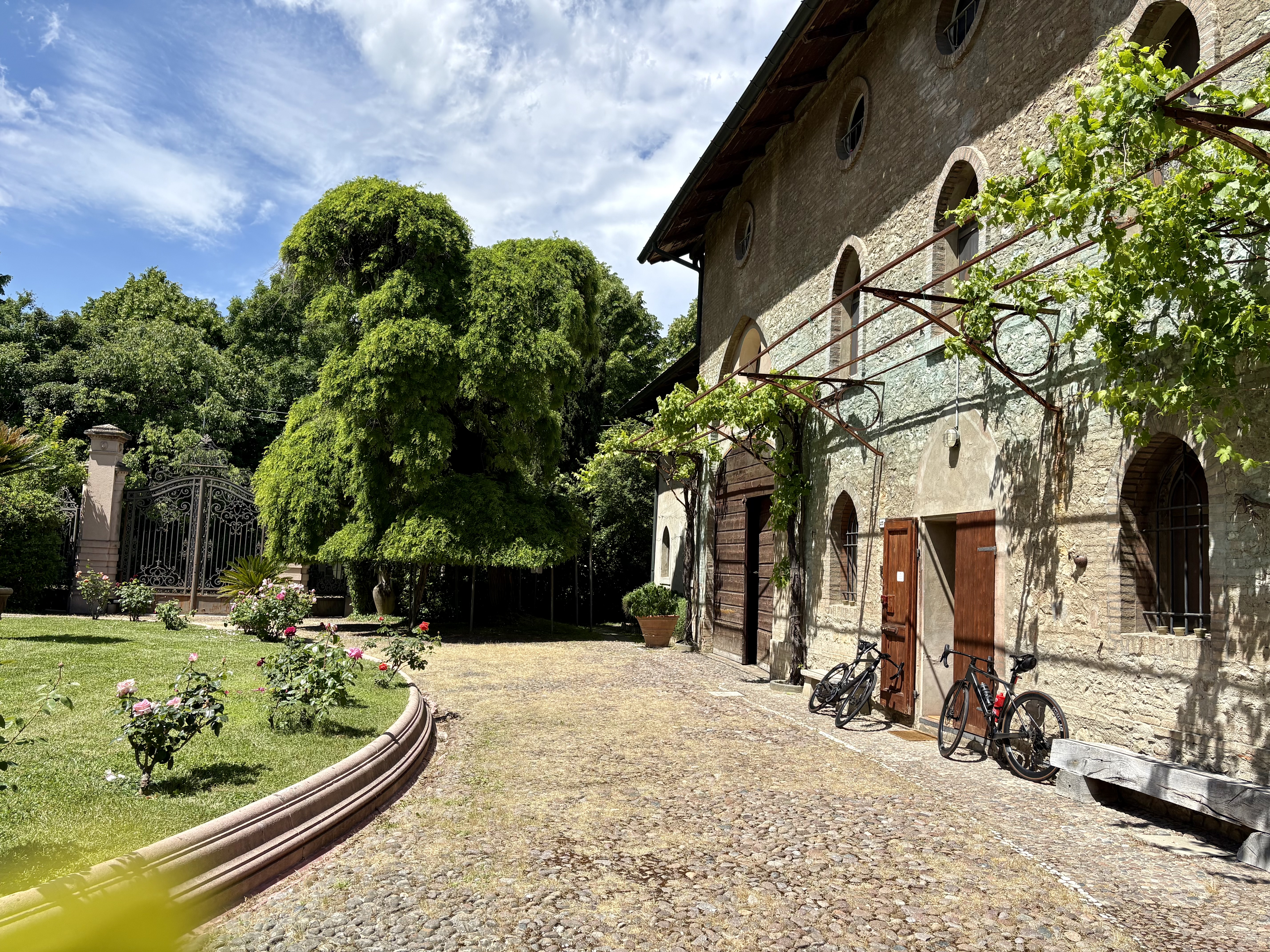 Historic villa hotel in Emilia-Romagna with bikes parked outside